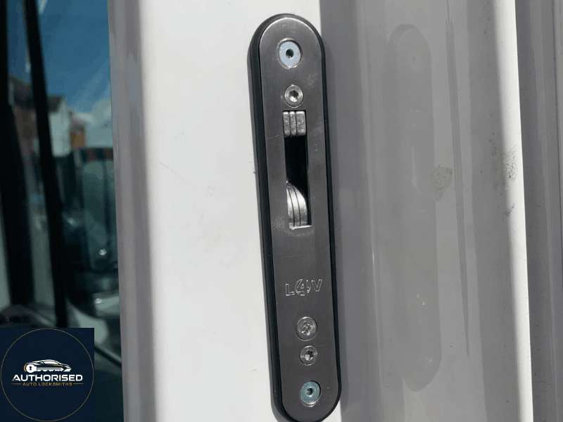 Van lock upgrade being fitted alongside existing factory lock in Essex