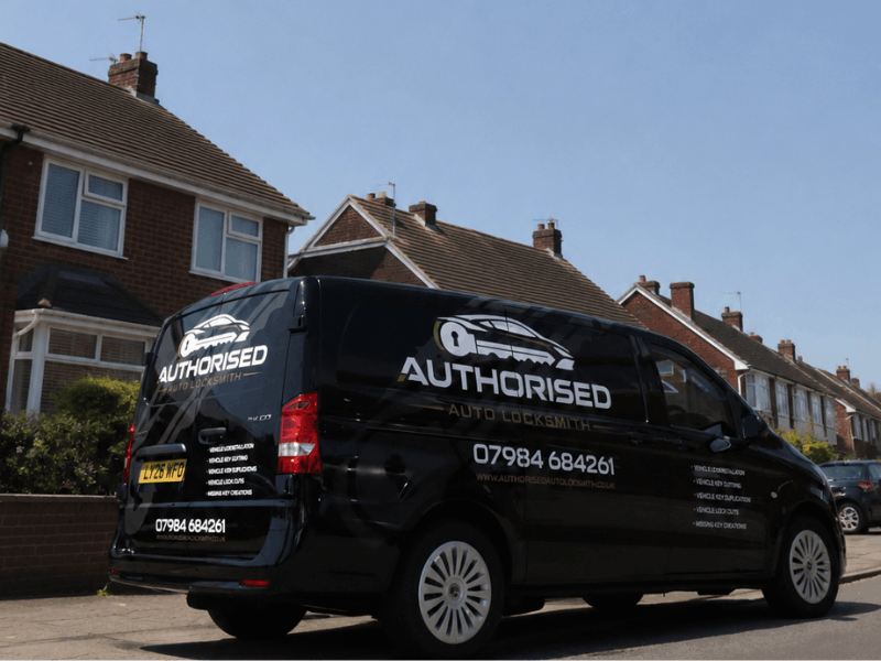 Mobile auto locksmith van arriving at a customer's home in Essex for car fob duplication