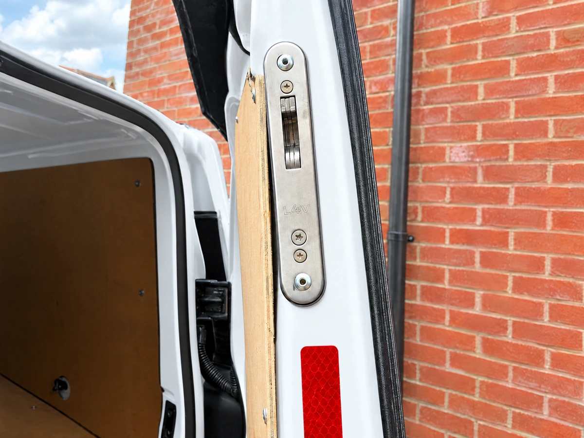 Deadlock being fitted to a van rear door in Braintree